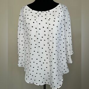 ELLE white with black squares shirt, size medium.